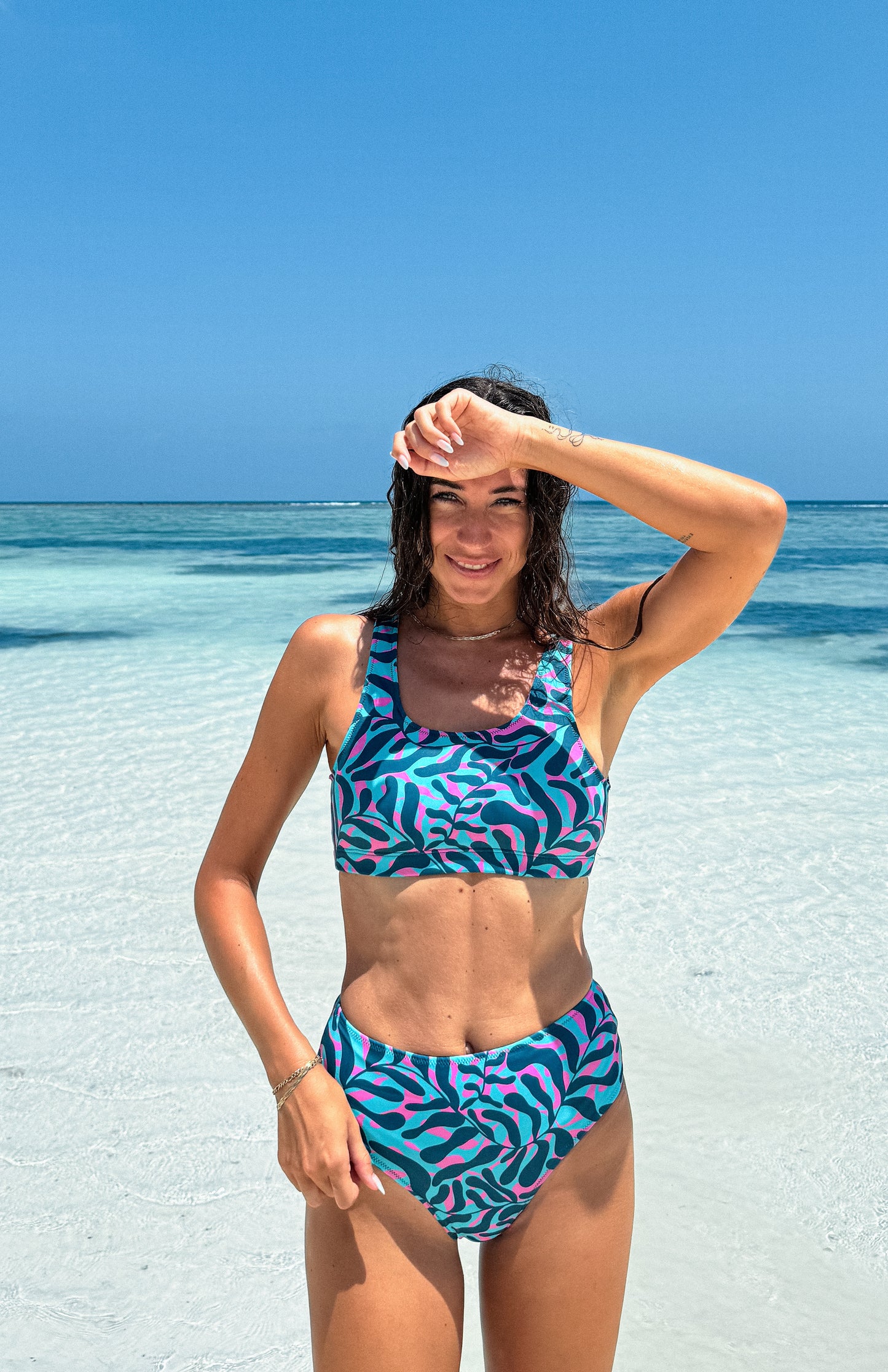 two piece sporty bikini set - top - for surfing, swimming, kiting or beach days with a print in turquoise, blue and pink