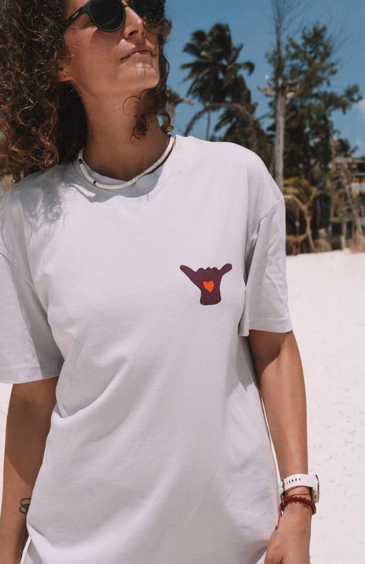 short sleeve cotton light violet t-shirt with an oversized fit with front and back print - citizen of the sea - with shells and Shaka