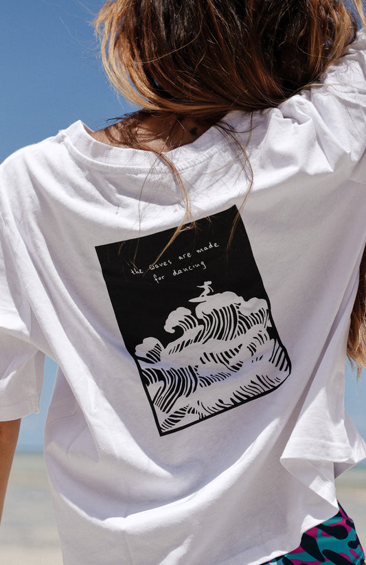 white cotton boxy women's t-shirt with from and back print with surfer illustration - the waves were made for dancing - loose fit