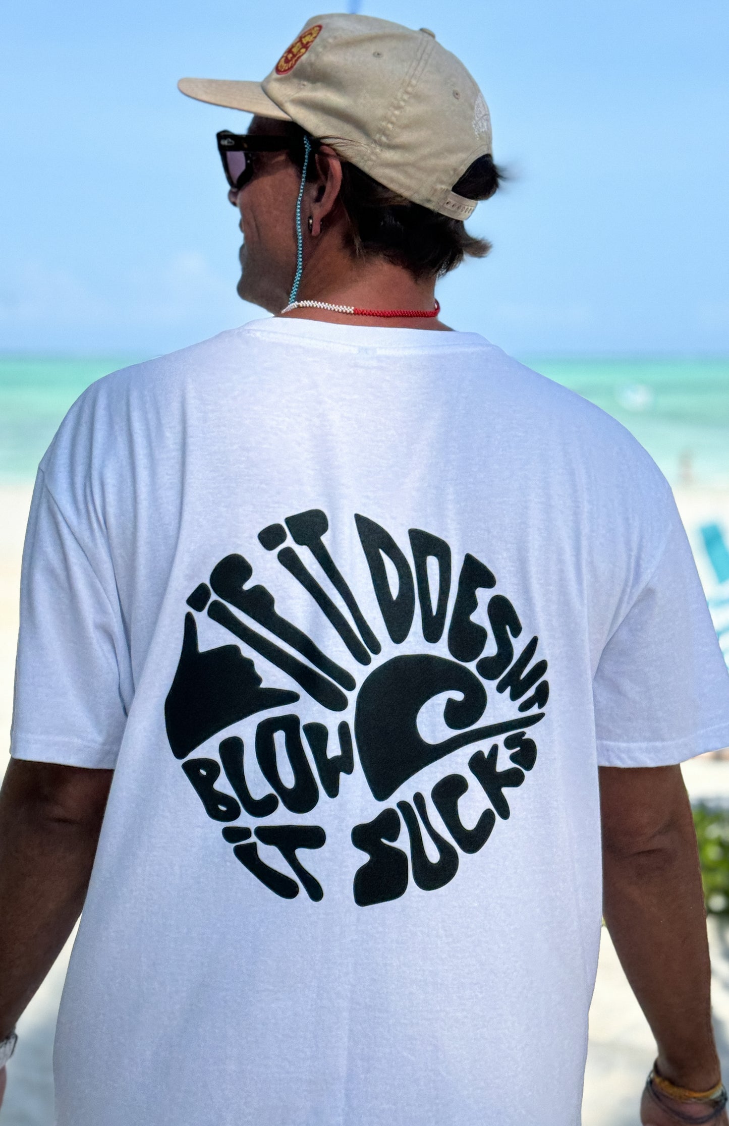 short sleeve cotton white t-shirt with an oversized fit with front and back print - if it doesn't blow it sucks for all the kite surfers