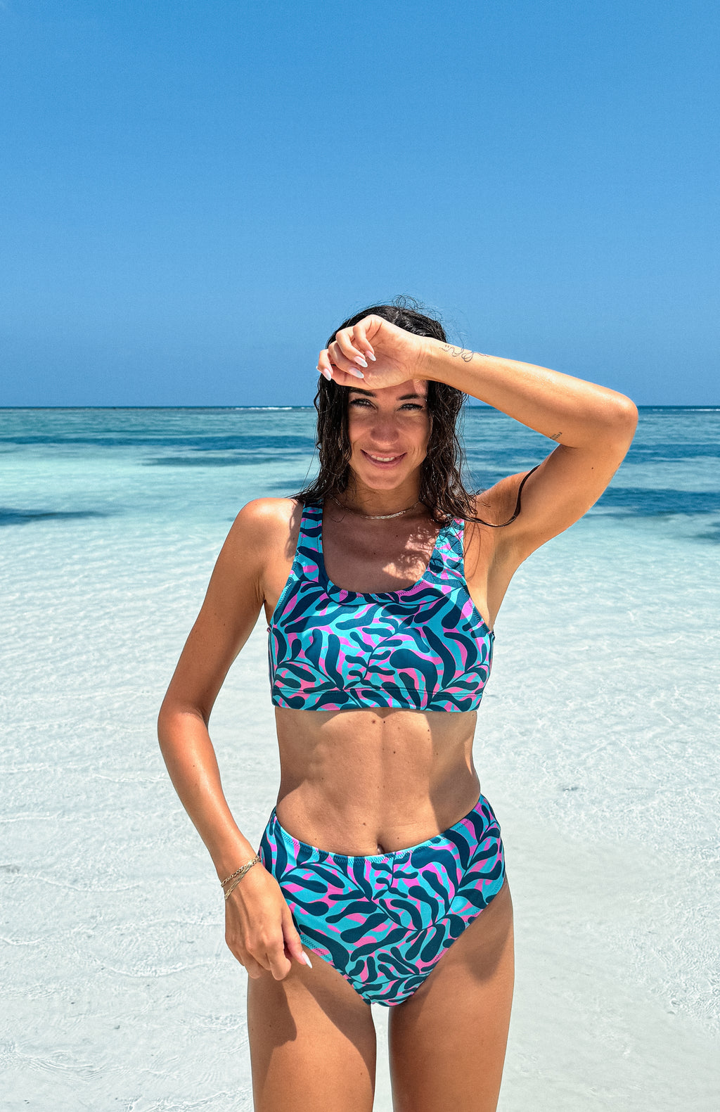two piece sporty bikini set - top - for surfing, swimming, kiting or beach days with a print in turquoise, blue and pink