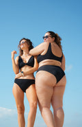 two piece bikini set - bottom high rise - for surfing, swimming, kiting or beach days with a solid and classic black color 