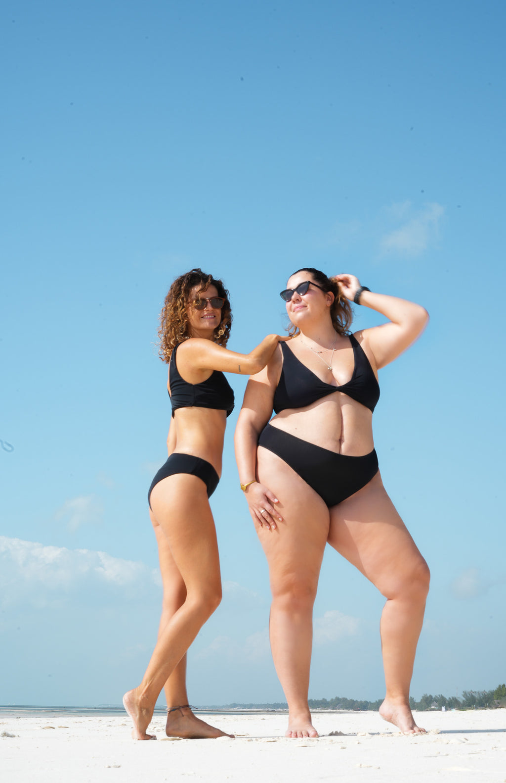 two piece bikini set - bottom high rise - for surfing, swimming, kiting or beach days with a solid and classic black color 