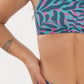 pink and blue print with leaves, swim suit, two pieces, top, bottom, close up