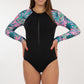 one piece, swimsuit, long sleeve, black body, printed sleeves, pink print with leaves and dots, front, full body